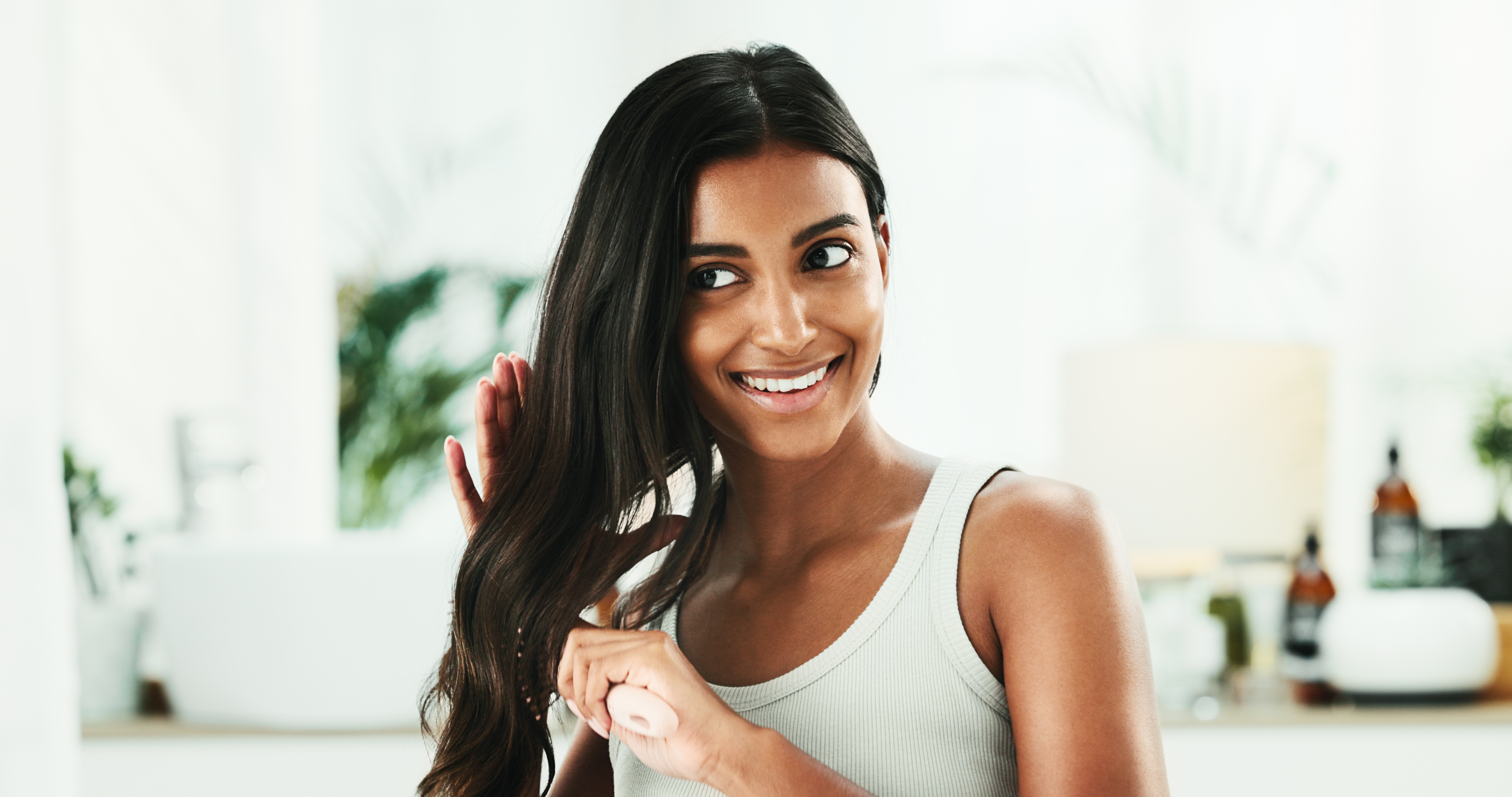 Woman Brushing Hair in The Morning